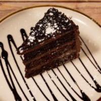 3 Layer Chocolate Cake · Scratch made chocolate cake this colossal slice is sure to please.