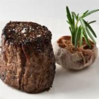 12 oz Center-Cut Filet Mignon · All of our steaks are prepared with our signature Strip House salt and pepper char. Served w...