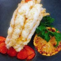 Cold Water Twin Tails · (2) 6 oz lobster tails broiled in old bay butter and served with drawn butter.
