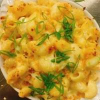 Mac & Cheese · White cheddar cheese, topped with toasted panko breadcrumbs and scallions