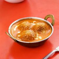 Malai Kofta · Mixture of vegetable and cottage cheese balls cooked with creamy tomato sauce.