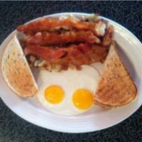 Traditional Breakfast · 2 extra large eggs, choice of bacon, ham or sausage.