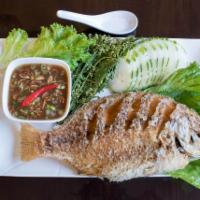 32. Fish with Tamarind Sauce  Dish · Whole fresh tilapia or catfish fried to perfect crispy dipped with sweet and sour tamarind s...