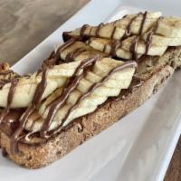 Nutella Toast · Seeded multi grain bread, Olive oil, Banana, Nutella, Cinnamon
