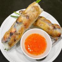 A7. Ga Nuong Cuon · 2 rolls grilled chicken salad rolls. Rice paper wrapped grilled chicken, vermicelli, lettuce...