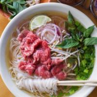#1. Pho Tai · Eye of round steak. Eye of round steak with noodle and beef broth. Topped with white onion, ...