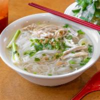 #13. Pho Ga · Chicken. Chicken with noodle and chicken broth. Topped with white onion, green scallion and ...