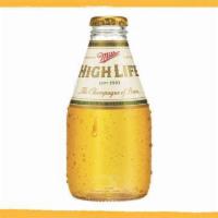 Miller High Life Lager Bottle · American Adjunct Lager - Milwaukee, WI - 4.6% ABV - 7oz Bottle - A classic American-style la...