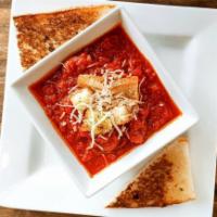 New Pappa Al Pomodoro Soup · Zesty tomatoes, basil, a touch of garlic and croutons.