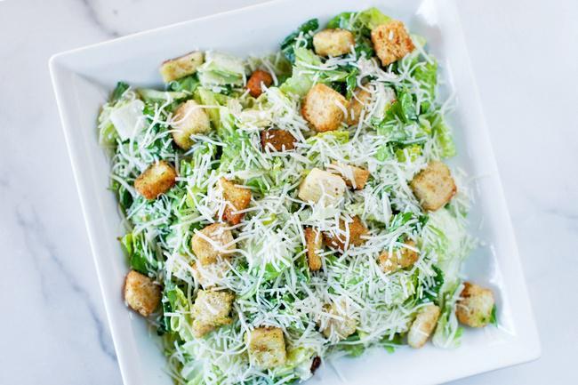 Caesar Salad · Romaine lettuce, parmesan cheese and
croutons (Vegetarian)