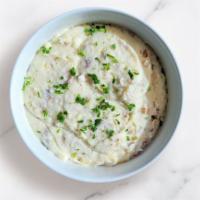 Single Side Garlic Mashed Potatoes · Mashed Potatoes with house made garlic butter and parsley  (Gluten Sensitive, Vegetarian)