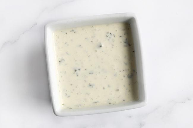 Ranch Dressing · Hand made traditional ranch dressing.  Made fresh from buttermilk, cream, mayonaire, lime juice, parsley, dill, chives and seasonings