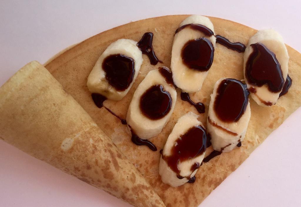12. Nutella Crepe with Topping · Banana or almond or marshmallow or peach.