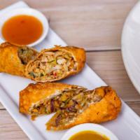Homemade Chicken & Peanut Egg Rolls (2) · Hand rolled daily, with sweet and sour, and mustard sauces.