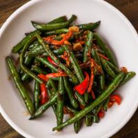 Spicy Vegetarian Sichuan Green Beans · Wok-tossed green beans, carrots, ginger, Fresno peppers.
