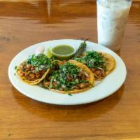 Grilled Chicken Tacos Platter · 3 Grilled Chicken Tacos topped with chopped onions and cilantro, grilled jalapeno and green ...
