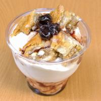 Sweet Greek · Greek yogurt, crumbled baklava and sour cherry compote. 