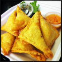 Crispy Crab Wonton · 4  pieces. Fried wonton filled with cream cheese and crabstick served with sweet sauce.