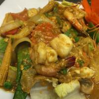 Seafood Pad-Pong-Karie · Stir-fried shrimp, scallop and squid in Thai curry powder sauce with egg, carrot, Chinese ce...