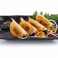 4 Pieces Gyoza · Fired pork dumpling.