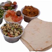 Sampler Plate · Hummas, shiraz eggplant, tobbouleh, quinoa and shiraz salad. Vegetarian.