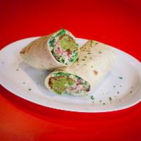 Falafel Wrap · Chickpea patties, lettuce, tomatoes, parsley and served on choice of bread, wrap or as a sal...
