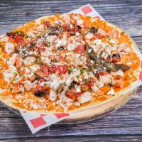 Chicken Flatbread Pizza · Chicken, roasted tomatoes, roasted onions, parsley, scallions, feta cheese and chipotle.