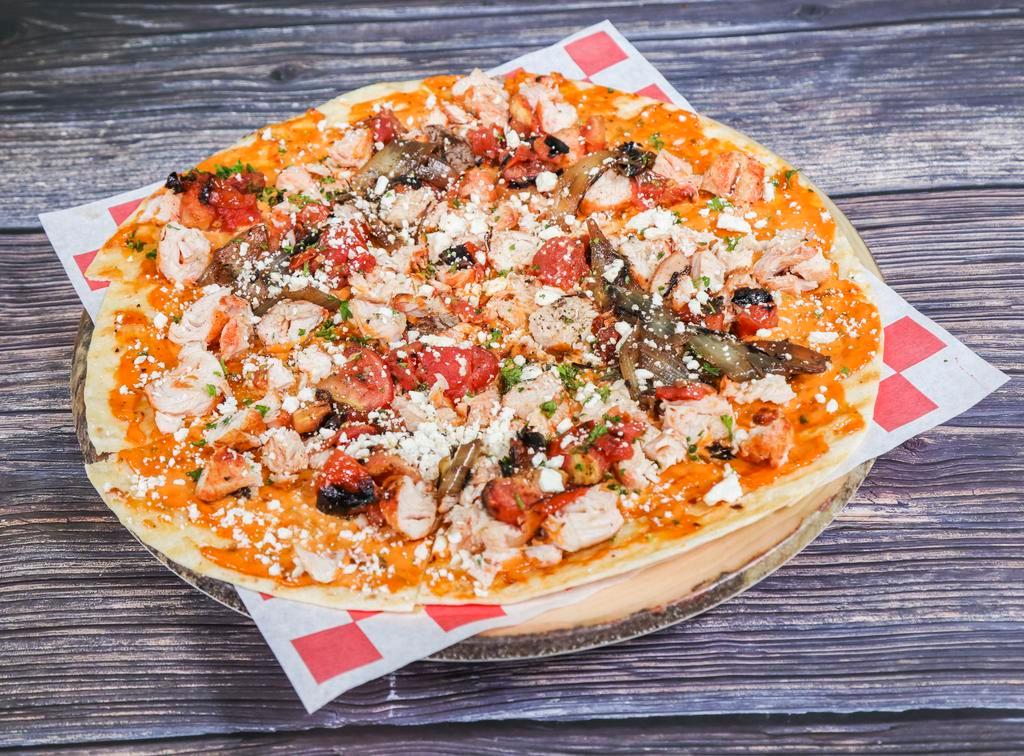 Chicken Flatbread Pizza · Chicken, roasted tomatoes, roasted onions, parsley, scallions, feta cheese and chipotle.