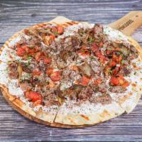 Ground Beef Flatbread Pizza · Ground beef, tzatziki, parsley, roasted onions and scallions.