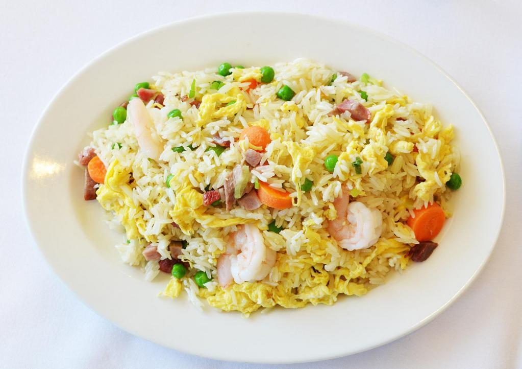 Yang Chow Fried Rice 扬州炒饭 · Fried white rice with roast pork, chicken, shrimp, green peas, carrot, eggs, onion and green scallion, it's a delicious one-pot meal!