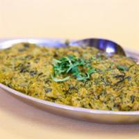 Lamb Palak  · Pieces of lamb and Spinach cooked in spices. (a la carte)
