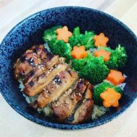 Teriyaki Chicken Bowl · Chicken, rice, broccoli, carrots, teriyaki sauce and sesame seeds.
