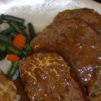 Baked Meatloaf · Served with mashed potatoes and gravy. Also includes a choice of soup, salad or coleslaw.
