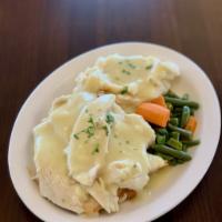 Roast Turkey  · Stuffing, mashed potatoes and gravy, vegetable and a choice of soup, salad, or slaw.
