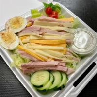 Chef Salad · Dearborn ham, turkey, American, Swiss and an egg.