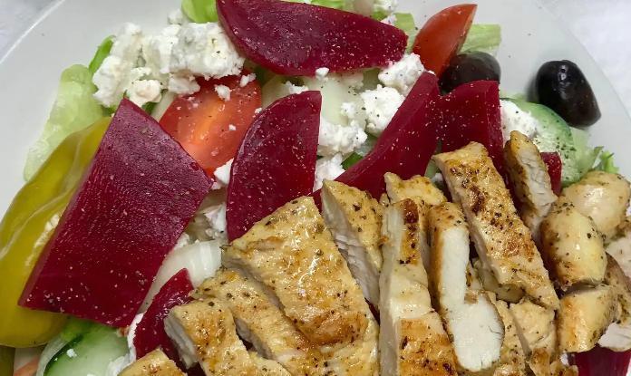 Large Grilled Chicken Greek  · Grilled chicken breast, feta cheese, tomato, cucumber, green pepper, onion, kalamata olives, beets, and pepperoni.