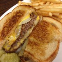 Patty Melt · Grilled onions and melted American cheese on grilled rye bread. Add a Coke or an ice tea for...