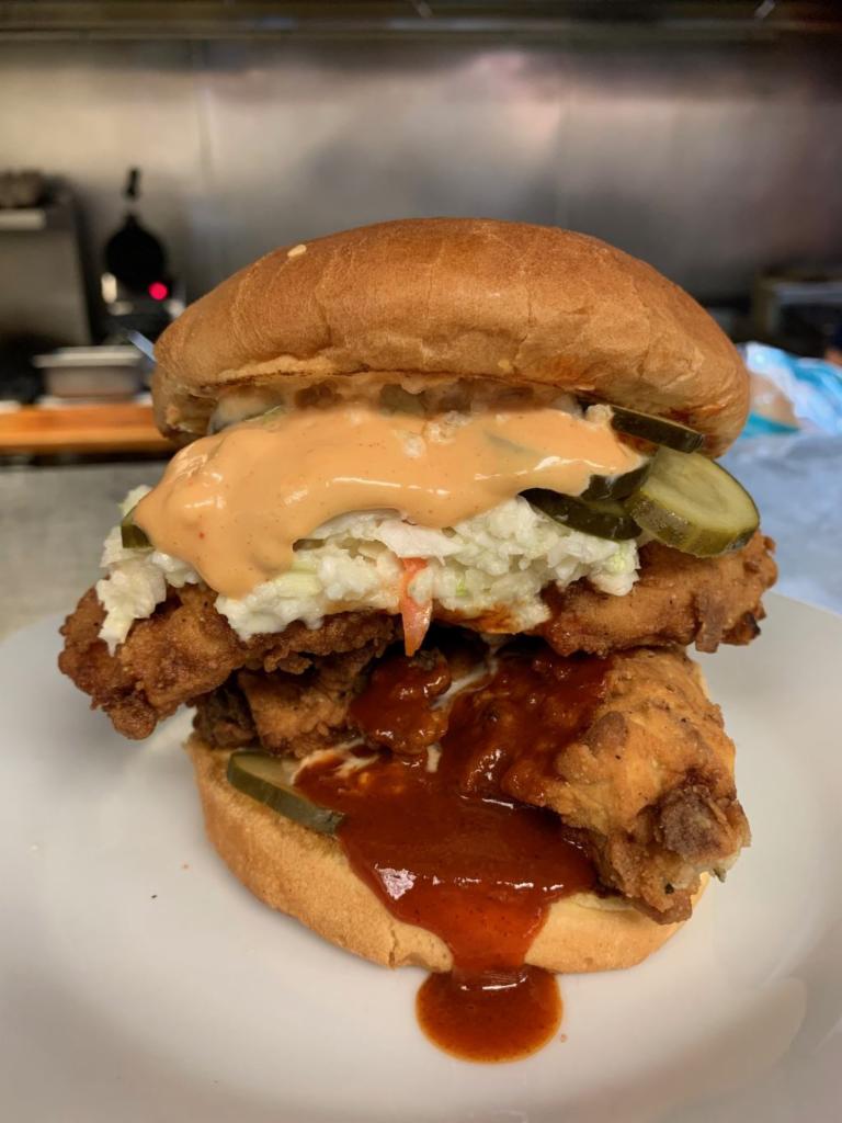 Spicy Chicken ·  Crispy Chicken Breast Hand Dipped in Buttermilk and topped with Spicy Mayo, Nashville Hot Sauce, Pickles & Slaw!