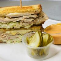 Turkey Reuben Sandwich · Oven roasted turkey, Slaw and Swiss. Add a coke or an ice tea for an additional charge.