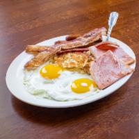Mom Breakfast · 2 eggs, 2 bacon, 2 sausage and ham and a choice of hash browns and toast or pancakes. 