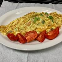 Vegetable & Cheese Omelete · Onion, green pepper, broccoli, mushroom, tomato and cheese. Includes hash browns and toast o...
