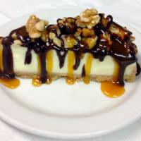 Turtle Cheesecake · Chocolate ganache, walnuts and caramel. 