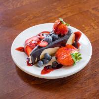 Berry Cheesecake · Chocolate ganache, fresh berries.