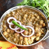 Chole Meal  · Chickpea stew. Served with rice, dal, raita, Goan cabbage salad and spicy pickle. Gluten fre...