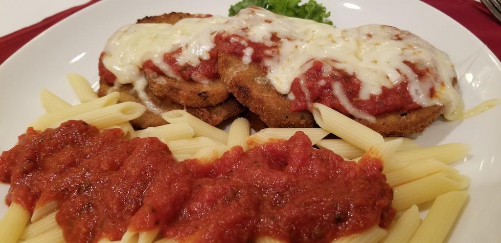Eggplant Parmigiana · Fresh sliced eggplant encrusted with our herb seasoned Italian bread crumbs, baked off with tomato meat sauce and select blend of cheeses.