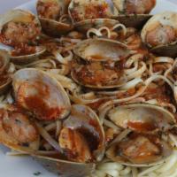 Clams ala Zuppa · Our fresh locally sourced little necks steamed in our own spicy red or white clam sauce. Ser...
