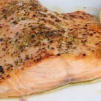 Key West Salmon · Fresh filet of salmon rubbed with lemon, basil and thyme key West spices and then broiled to...