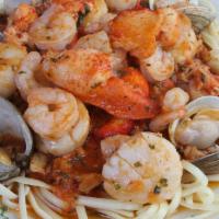 Fruite del Mare · Lobster, little necks, shrimp, scallops and blue crab sauteed with tomatoes and scallions in...