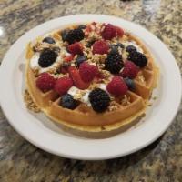 Mixed Berry Waffle · Topped with low-fat yogurt, granola, fresh strawberries and blueberries.