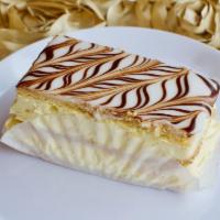 Napoleon · Layers of puff pastries and custard filling with a poured sugar topping
